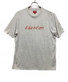 SUPREME（シュプリーム）の古着「Flames S/S Top」｜ホワイト×オレンジ
