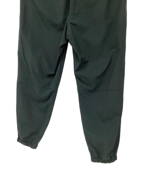 UNIVERSAL PRODUCTS.（ユニバーサルプロダクツ）UNIVERSAL PRODUCTS. (ユニバーサルプロダクツ) ナイロンシェルトラックパンツ グリーン サイズ:2の古着・服飾アイテム