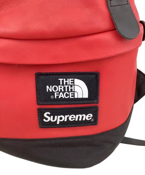 THE NORTH FACE（ザ ノース フェイス）THE NORTH FACE (ザ ノース フェイス) SUPREME (シュプリーム) シュプリーム/ザ ノース フェイス/NF0A3G73/レザーデイパック レッド×ブラックの古着・服飾アイテム