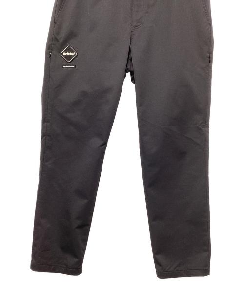 F.C.R.B.（エフシーレアルブリストル）F.C.R.B. (エフシーレアルブリストル) ロゴストレッチロングパンツ ブラック サイズ:XLの古着・服飾アイテム