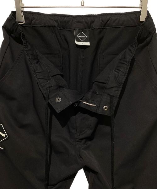 F.C.R.B.（エフシーレアルブリストル）F.C.R.B. (エフシーレアルブリストル) ロゴストレッチロングパンツ ブラック サイズ:XLの古着・服飾アイテム