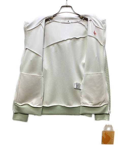 le coq sportif GOLF（ルコック スポルティフ ゴルフ）le coq sportif GOLF (ルコック スポルティフ ゴルフ) マシュマロタッチグラフィックジャケット ホワイト×グリーン サイズ:M 未使用品の古着・服飾アイテム