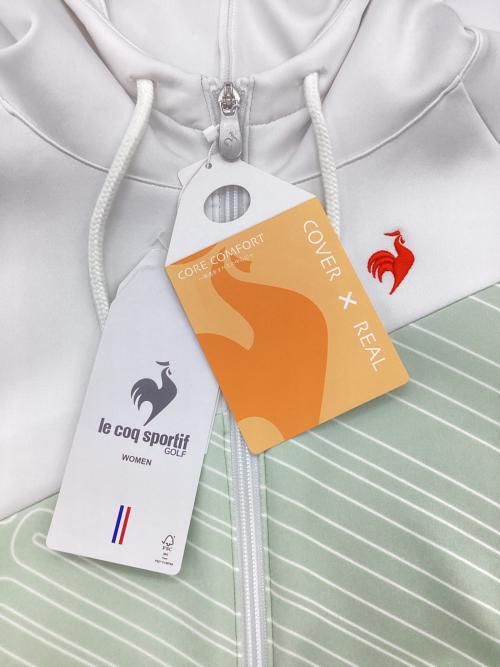 le coq sportif GOLF（ルコック スポルティフ ゴルフ）le coq sportif GOLF (ルコック スポルティフ ゴルフ) マシュマロタッチグラフィックジャケット ホワイト×グリーン サイズ:M 未使用品の古着・服飾アイテム