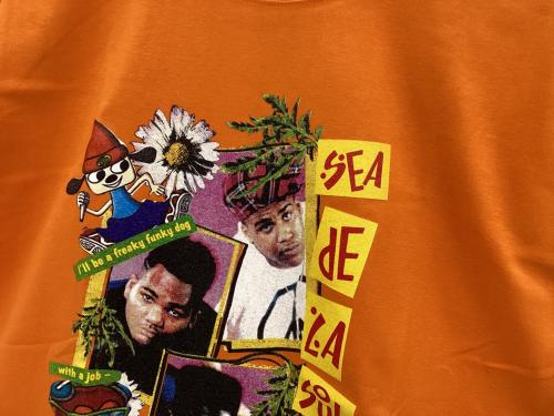 WIND AND SEA×PARAPPA×DE LA SOUL（ウィンダンシー）WIND AND SEA×PARAPPA×DE LA SOUL (ウィンダンシー) プリントTシャツ オレンジ サイズ:S 未使用品の古着・服飾アイテム