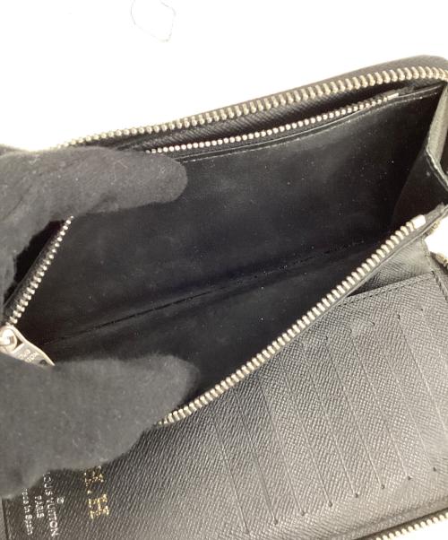 LOUIS VUITTON（ルイ ヴィトン）LOUIS VUITTON (ルイ ヴィトン) ルイヴィトン/ダミエ・グラフィット/	N63095/ジッピー・ウォレットヴェルティカル/ラウンドファスナー長財布の古着・服飾アイテム