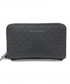 MICHAEL KORSマイケル・コース）の古着「ダブルジップ」｜ブラック×グレー