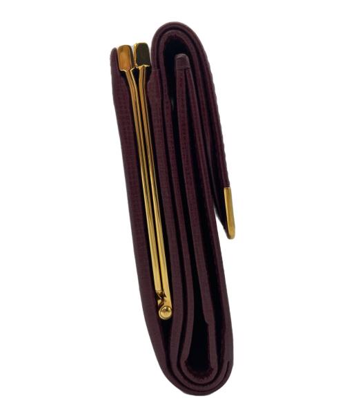 Cartier（カルティエ）Cartier (カルティエ) 3つ折り財布 ボルドー×ゴールド色の古着・服飾アイテム