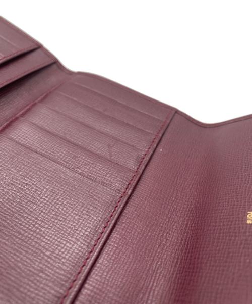 Cartier（カルティエ）Cartier (カルティエ) 3つ折り財布 ボルドー×ゴールド色の古着・服飾アイテム