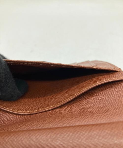 LOUIS VUITTON（ルイ ヴィトン）LOUIS VUITTON (ルイ ヴィトン) がま口財布の古着・服飾アイテム