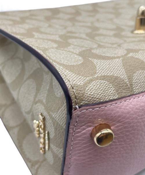 COACH（コーチ）COACH (コーチ) Disney (ディズニー) シグネチャー 2WAYバッグ  ピンクの古着・服飾アイテム