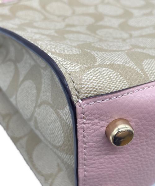 COACH（コーチ）COACH (コーチ) Disney (ディズニー) シグネチャー 2WAYバッグ  ピンクの古着・服飾アイテム