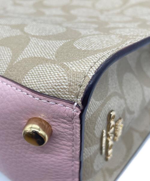 COACH（コーチ）COACH (コーチ) Disney (ディズニー) シグネチャー 2WAYバッグ  ピンクの古着・服飾アイテム