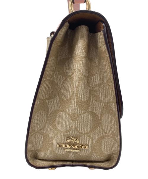 COACH（コーチ）COACH (コーチ) Disney (ディズニー) シグネチャー 2WAYバッグ  ピンクの古着・服飾アイテム