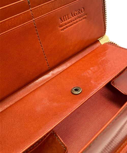 milagro（ミラグロ）MILAGRO (ミラグロ) ラウンドファスナー財布 オレンジ 未使用品の古着・服飾アイテム