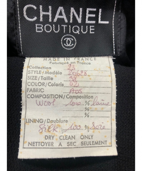 CHANEL（シャネル）CHANEL (シャネル) カメリアボタンセットアップ ブラック サイズ:38の古着・服飾アイテム