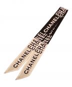 CHANELシャネル）の古着「ロゴツイリー」｜ホワイト×ブラック