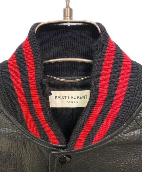 Saint Laurent Paris（サンローランパリ）Saint Laurent Paris (サンローランパリ) ダメージ加工リブラインオールラムレザー スタジャン テディ ジャケット ブラック×レッド サイズ:42の古着・服飾アイテム