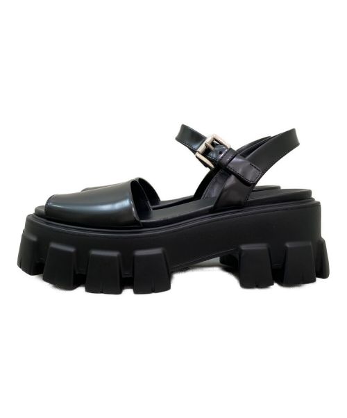 PRADA（プラダ）PRADA (プラダ) モノリスブラッシュドレザーサンダル ブラック サイズ:36 1/2の古着・服飾アイテム