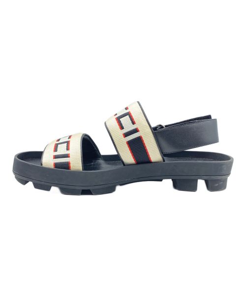 GUCCI（グッチ）GUCCI (グッチ) ロゴストラップサンダル ブラック×ベージュ サイズ:8の古着・服飾アイテム