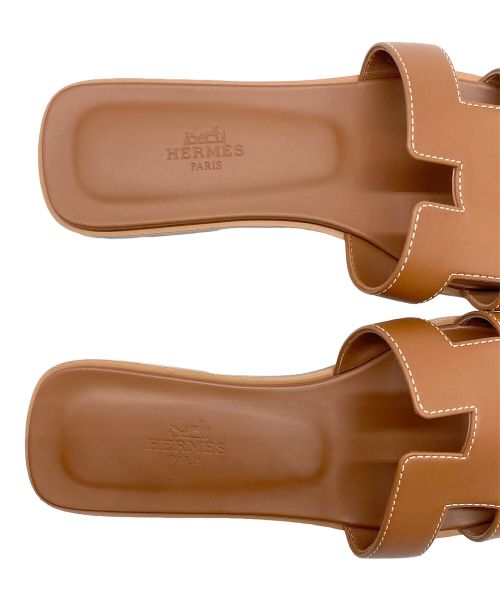 HERMES（エルメス）HERMES (エルメス) オラン Hロゴ レザー サンダル ブラウン サイズ:37の古着・服飾アイテム