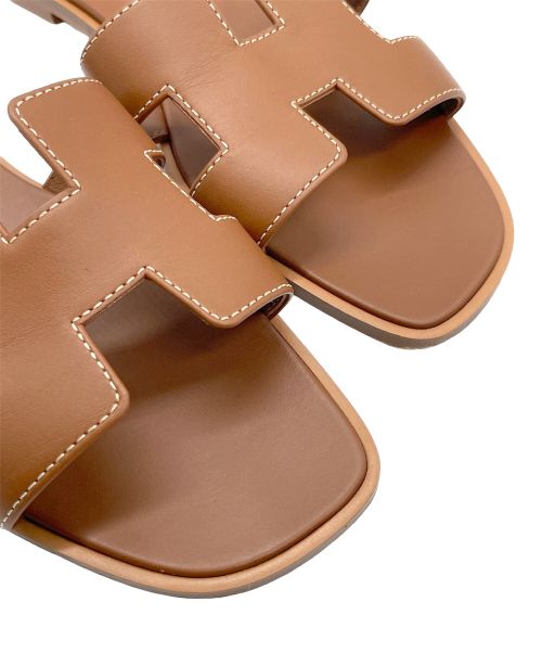 HERMES（エルメス）HERMES (エルメス) オラン Hロゴ レザー サンダル ブラウン サイズ:37の古着・服飾アイテム