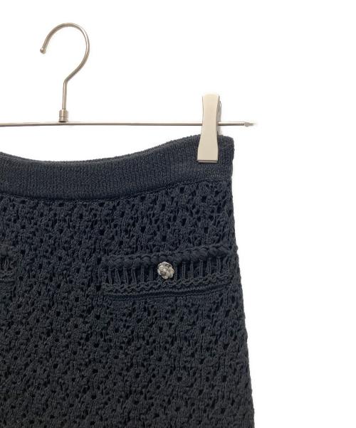 CHANEL（シャネル）CHANEL (シャネル) カメリアボタンニットスカート ブラック サイズ:SIZE 34の古着・服飾アイテム