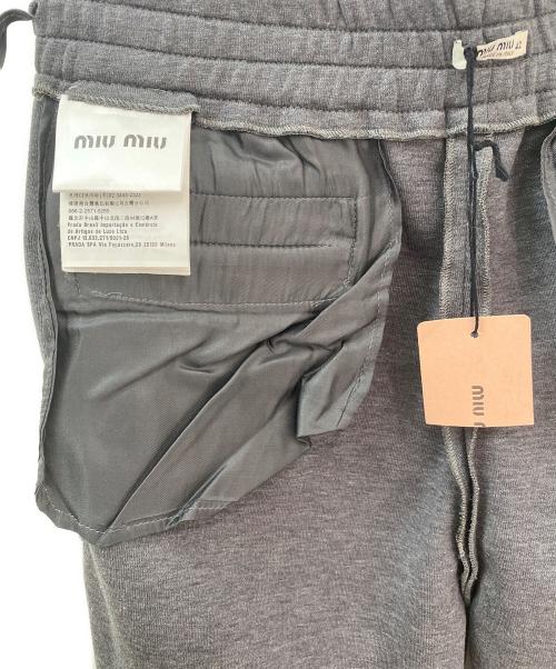 MIU MIU（ミュウミュウ）MIU MIU (ミュウミュウ) コットンジャージー トラックパンツ グレー サイズ:42の古着・服飾アイテム