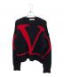 VALENTINO（ヴァレンティノ）の古着「VLTNロゴショートニット」｜ブラック×レッド