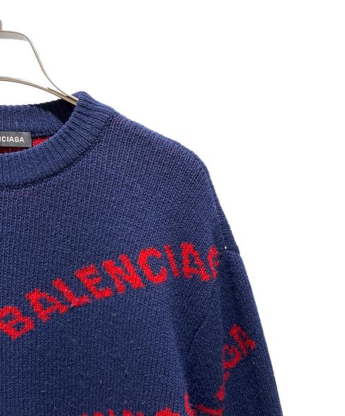 BALENCIAGA（バレンシアガ）BALENCIAGA (バレンシアガ) オールオーバーロゴニット ネイビー×レッド サイズ:Sの古着・服飾アイテム
