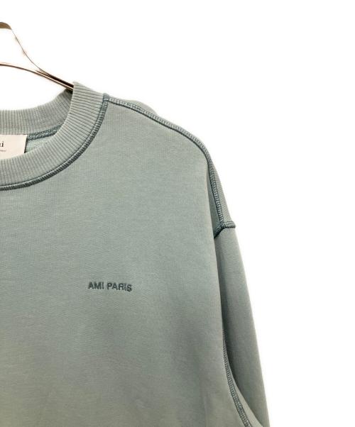 AMI PARIS（アミ パリス）AMI PARIS (アミ パリス) ダメージ加工ロゴスウェット/ユニセックス スカイブルー サイズ:XSの古着・服飾アイテム