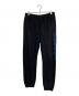 GUCCI（グッチ）の古着「ロゴスウェットパンツ」｜ブラック