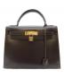 HERMES（エルメス）の古着「ケリー28/外縫い/ボックスカーフ/ブラウン/ゴールド金具/〇T(1999年製)」｜ブラウン