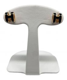 HERMES（エルメス）の古着「ミニポップHピアス/Mini Pop H Earrings」｜ゴールド×ブラック
