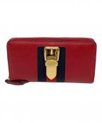 GUCCIグッチ）の古着「ラウンドファスナー財布」｜レッド