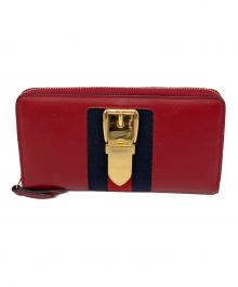 GUCCI（グッチ）の古着「ラウンドファスナー財布」｜レッド