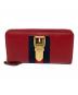 GUCCI（グッチ）の古着「ラウンドファスナー財布」｜レッド