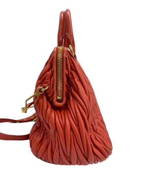 MIU MIU（ミュウミュウ）MIU MIU (ミュウミュウ) 2WAYバッグ マテラッセ オレンジの古着・服飾アイテム