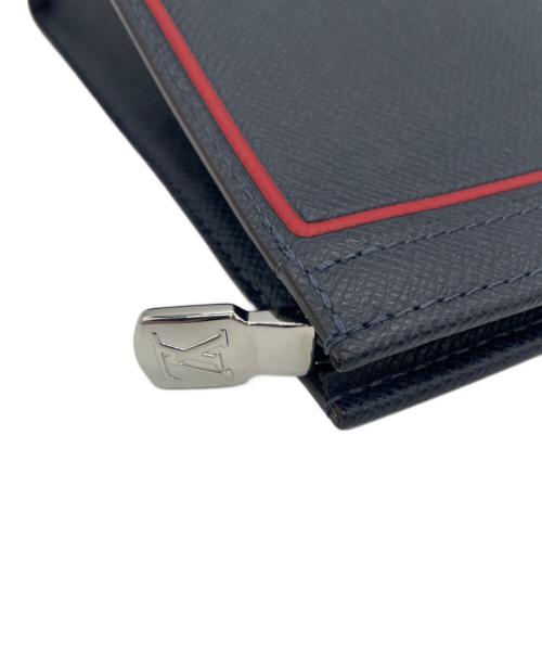 LOUIS VUITTON（ルイ ヴィトン）LOUIS VUITTON (ルイ ヴィトン) クラッチバッグ ポシェット ヴォワヤージュMM タイガ ネイビー×レッドの古着・服飾アイテム
