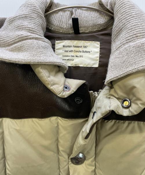MOUNTAIN RESEARCH（マウンテンリサーチ）MOUNTAIN RESEARCH (マウンテンリサーチ) コンチョボタンニット切替ダウンジャケット ベージュ×ブラック サイズ:Mの古着・服飾アイテム