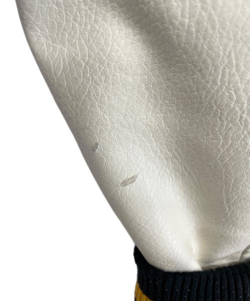 X-LARGE（エクストララージ）X-LARGE (エクストララージ) SPACE JAM (スペースジャム) スタジャン ブラック×イエロー サイズ:Lの古着・服飾アイテム