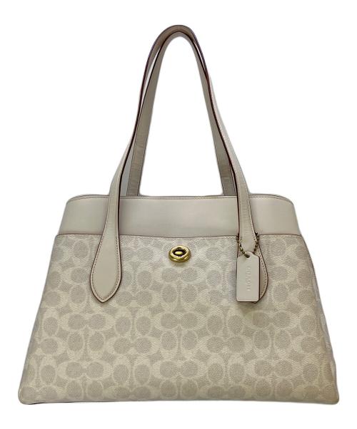 COACH（コーチ）COACH (コーチ) ハンドバッグ シグネチャー 	ローラキャリーオール アイボリーの古着・服飾アイテム