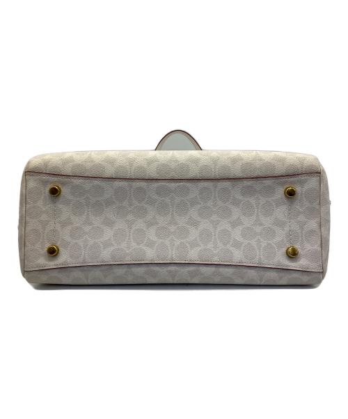 COACH（コーチ）COACH (コーチ) ハンドバッグ シグネチャー 	ローラキャリーオール アイボリーの古着・服飾アイテム