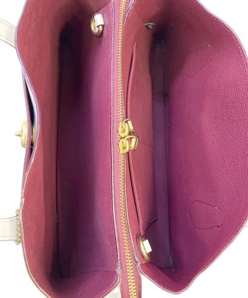 COACH（コーチ）COACH (コーチ) ハンドバッグ シグネチャー 	ローラキャリーオール アイボリーの古着・服飾アイテム