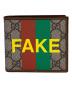 GUCCI（グッチ）の古着「2つ折り財布　FAKE/NOT」｜ブラウン