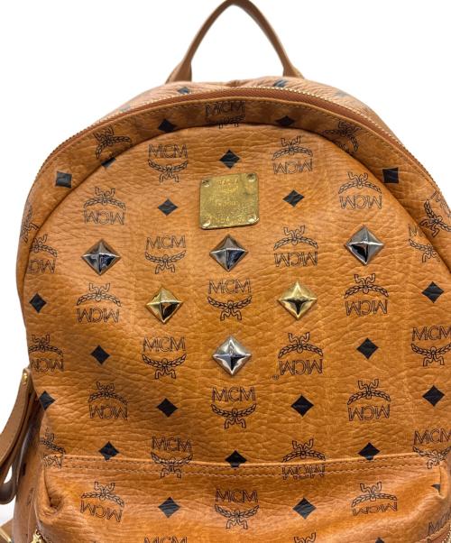 MCM（エムシーエム）MCM (エムシーエム) スタッズリュック ブラウンの古着・服飾アイテム