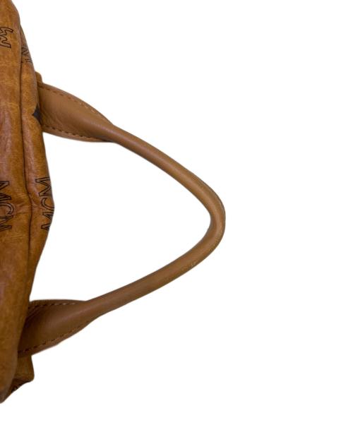 MCM（エムシーエム）MCM (エムシーエム) スタッズリュック ブラウンの古着・服飾アイテム