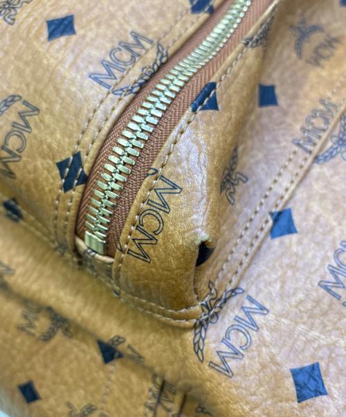 MCM（エムシーエム）MCM (エムシーエム) スタッズリュック ブラウンの古着・服飾アイテム