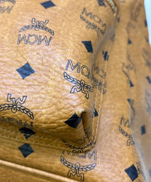 MCM（エムシーエム）MCM (エムシーエム) スタッズリュック ブラウンの古着・服飾アイテム