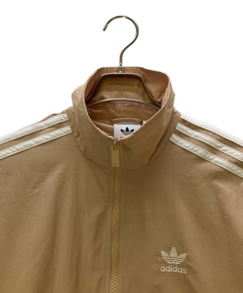 adidas（アディダス）adidas (アディダス) ウーブン ファイヤーバード トラックトップ ベージュ サイズ:XSの古着・服飾アイテム