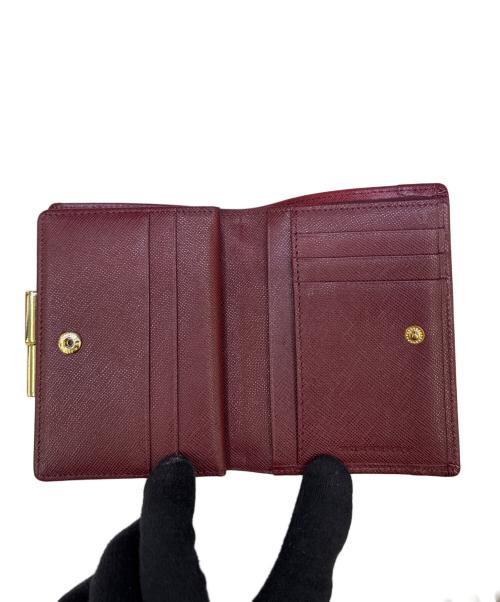 BURBERRY（バーバリー）BURBERRY (バーバリー) がま口2つ折り財布 ベージュ×レッドの古着・服飾アイテム